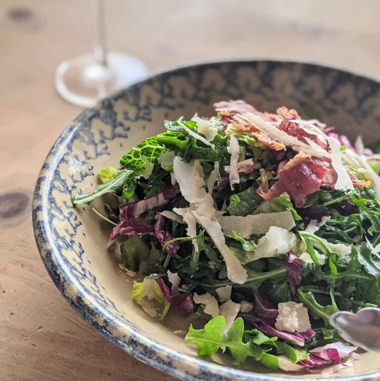 HDT Citrus Salad with Crispy Prosciutto plated and ready for the table