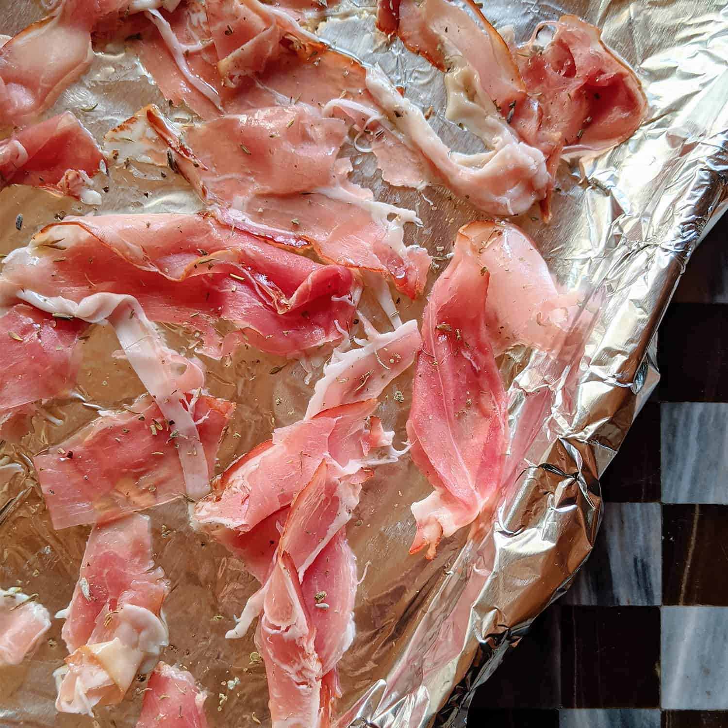 Citrus Salad with the Prosciutto prepped on a baking sheet