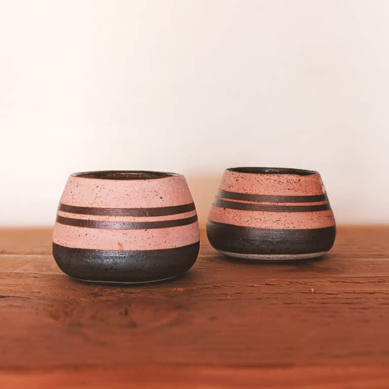 Sipping hot chocolate in two ceramic cups