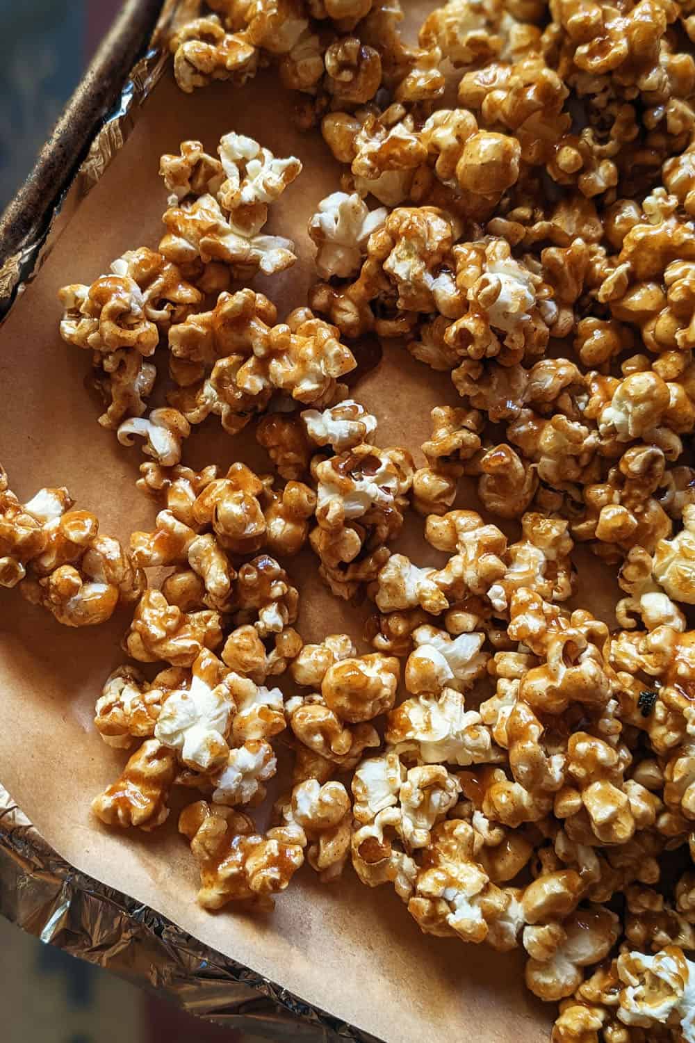 Red Chile Caramel Corn - on a sheet tray