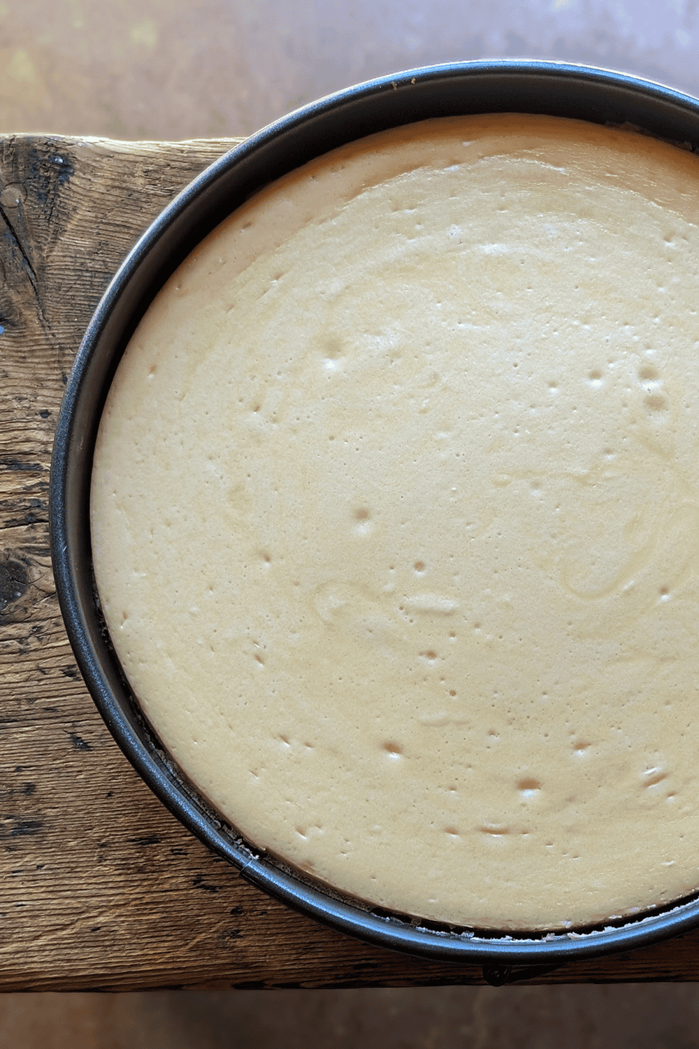 cloud cheesecake baked in a springform pan cooling