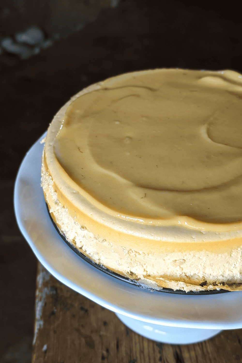 key lime cheesecake plated on a pedestal 