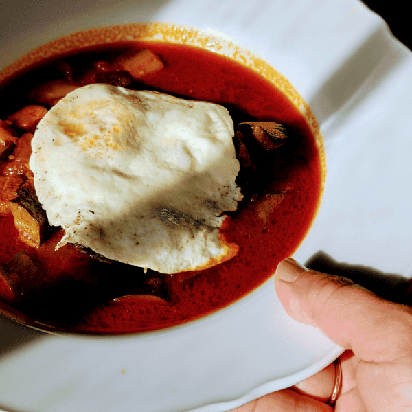 Beef and Red Chile Soup with fried egg