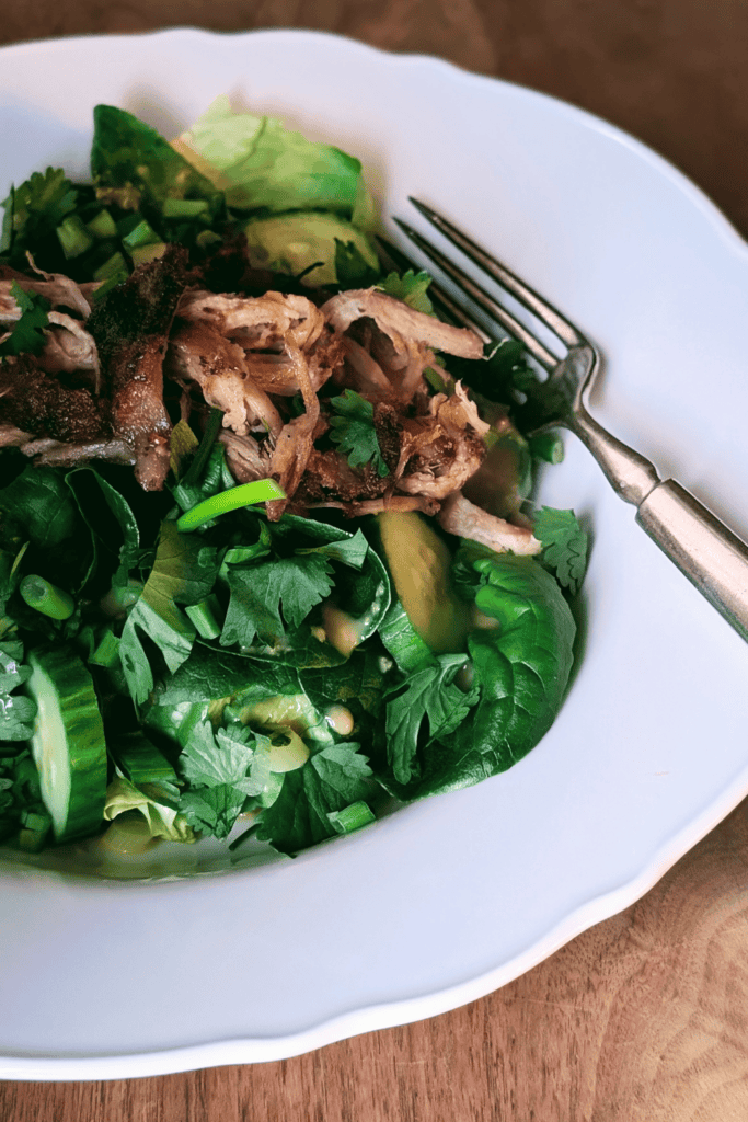 Slow Roasted Pork Shoulder - plated with greens